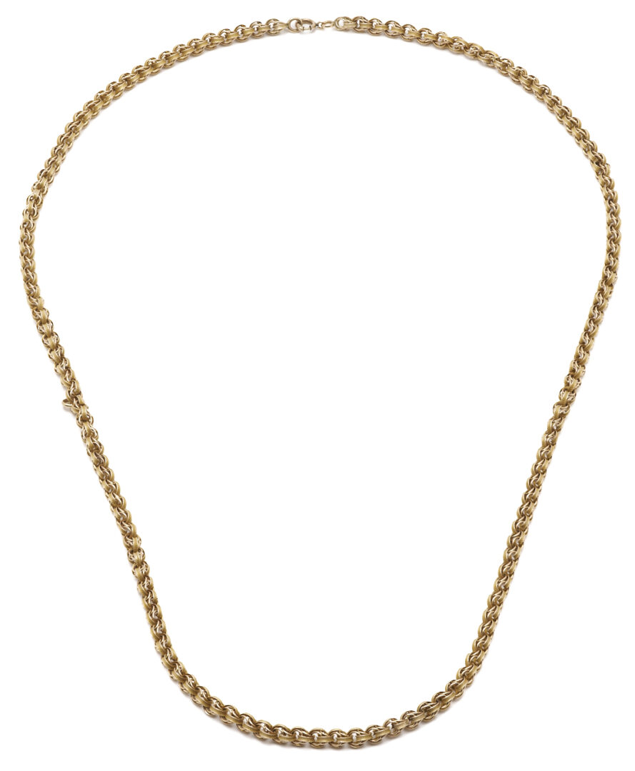 Lot 953: 10K Gold Triple Link Necklace