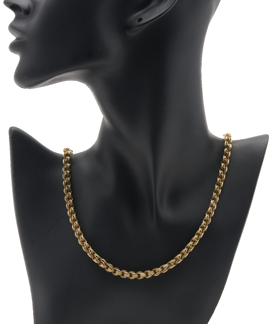 Lot 953: 10K Gold Triple Link Necklace