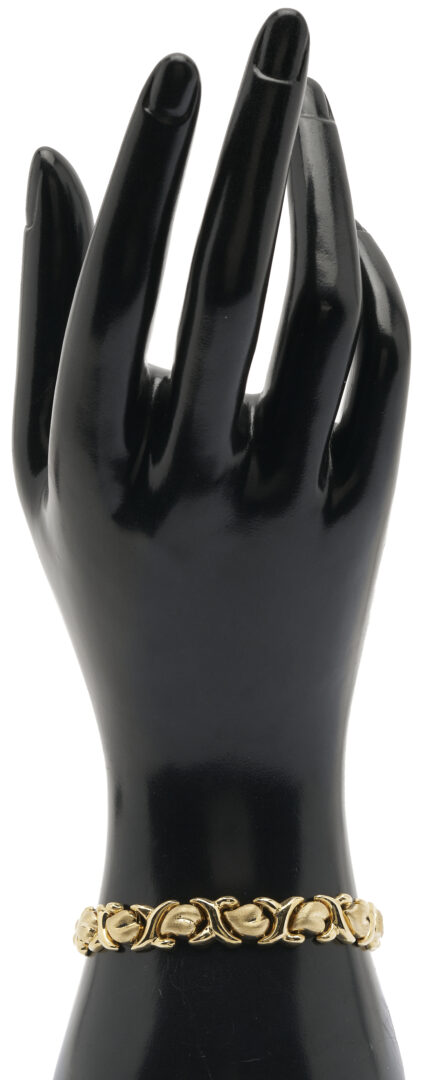 Lot 966: 14K Gold Heart Link Bracelet