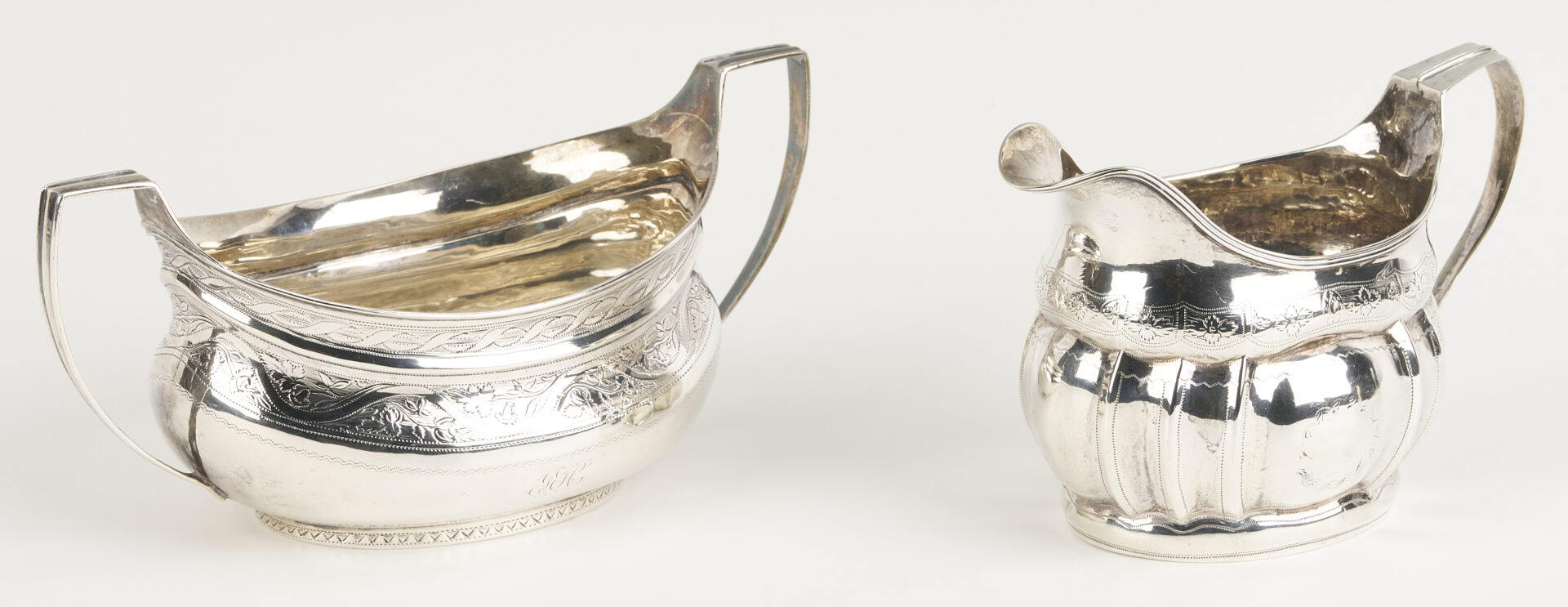 Lot 996: Irish Sterling Sugar Bowl & Cream Jug plus English Ladle, 3 pcs