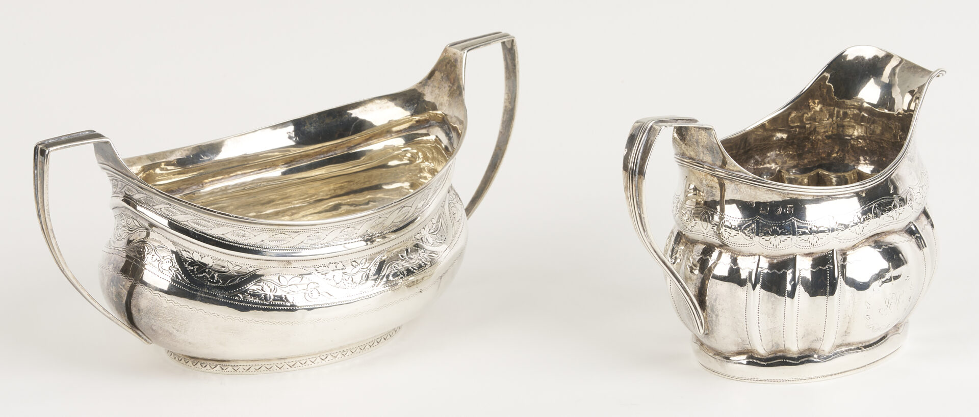 Lot 996: Irish Sterling Sugar Bowl & Cream Jug plus English Ladle, 3 pcs