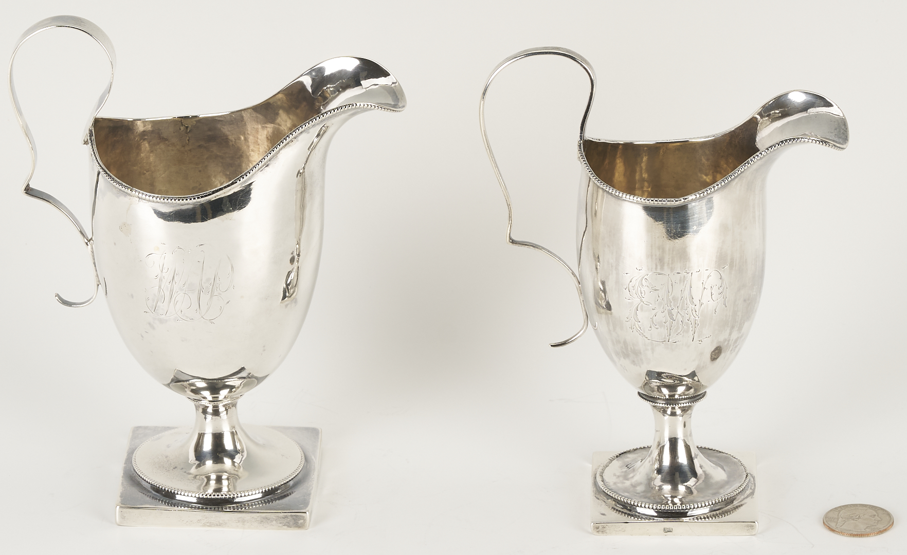 Lot 998: American Coin Silver Ladle, attrib. William Ward Jr. and 2 American Coin Silver Creamers, Joseph Shoemaker