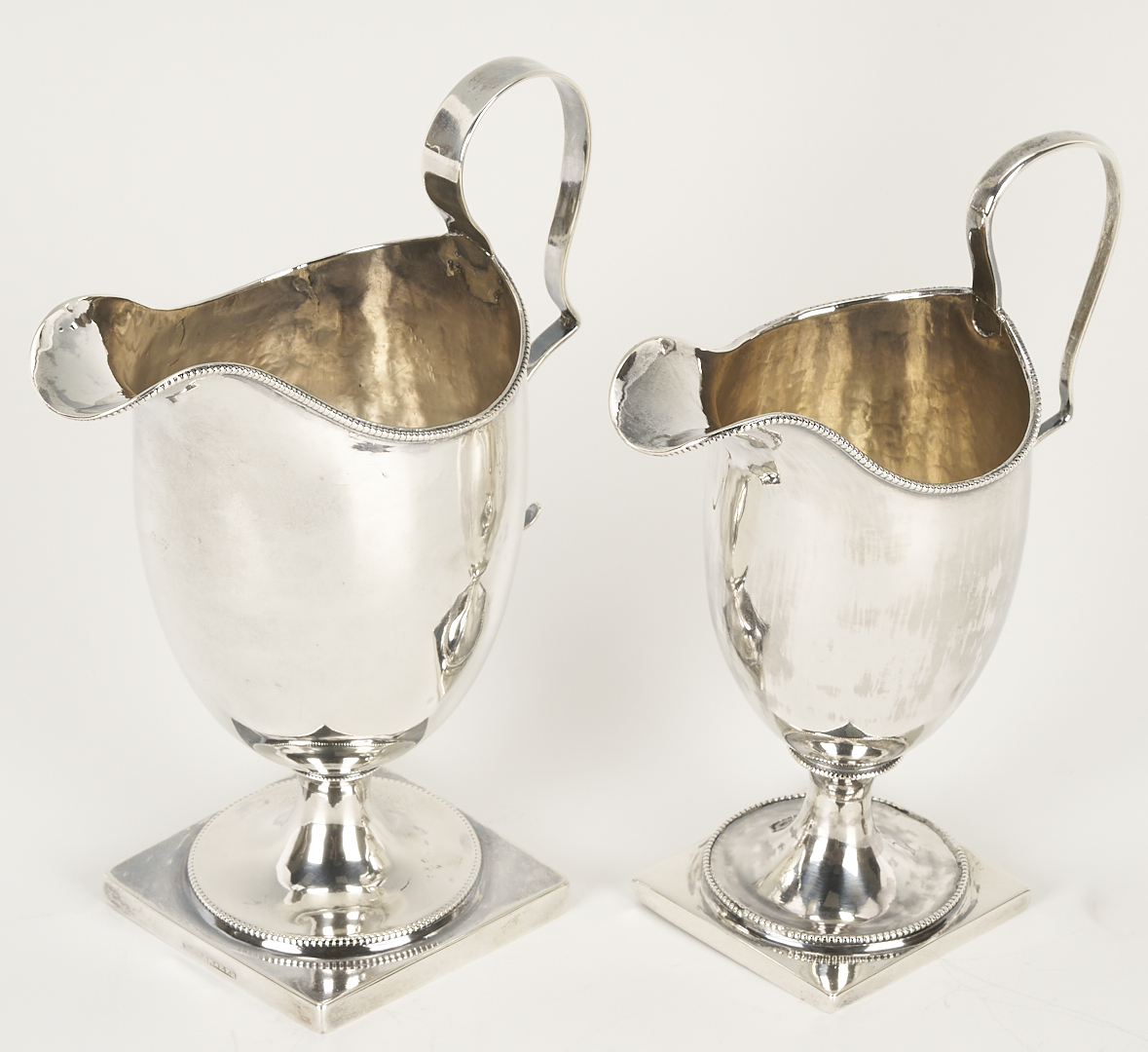 Lot 998: American Coin Silver Ladle, attrib. William Ward Jr. and 2 American Coin Silver Creamers, Joseph Shoemaker