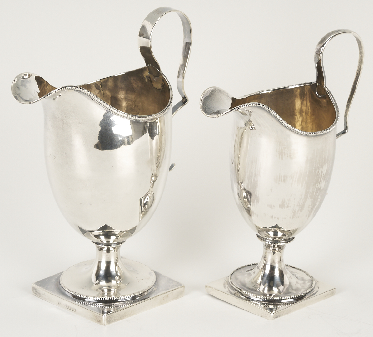 Lot 998: American Coin Silver Ladle, attrib. William Ward Jr. and 2 American Coin Silver Creamers, Joseph Shoemaker