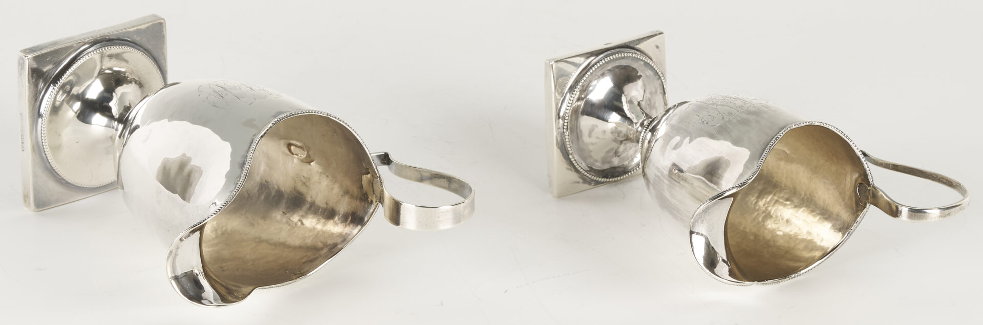 Lot 998: American Coin Silver Ladle, attrib. William Ward Jr. and 2 American Coin Silver Creamers, Joseph Shoemaker