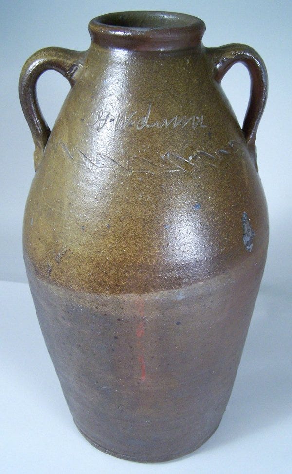 Lot 18: Middle Tennessee stoneware jar, signed in script "G W Dunn", sine wave incising
