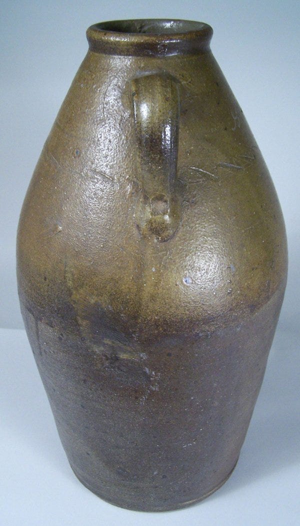 Lot 18: Middle Tennessee stoneware jar, signed in script "G W Dunn", sine wave incising