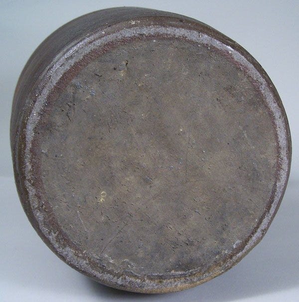 Lot 100: Greene County, Tennessee redware jar attributed to C A Haun