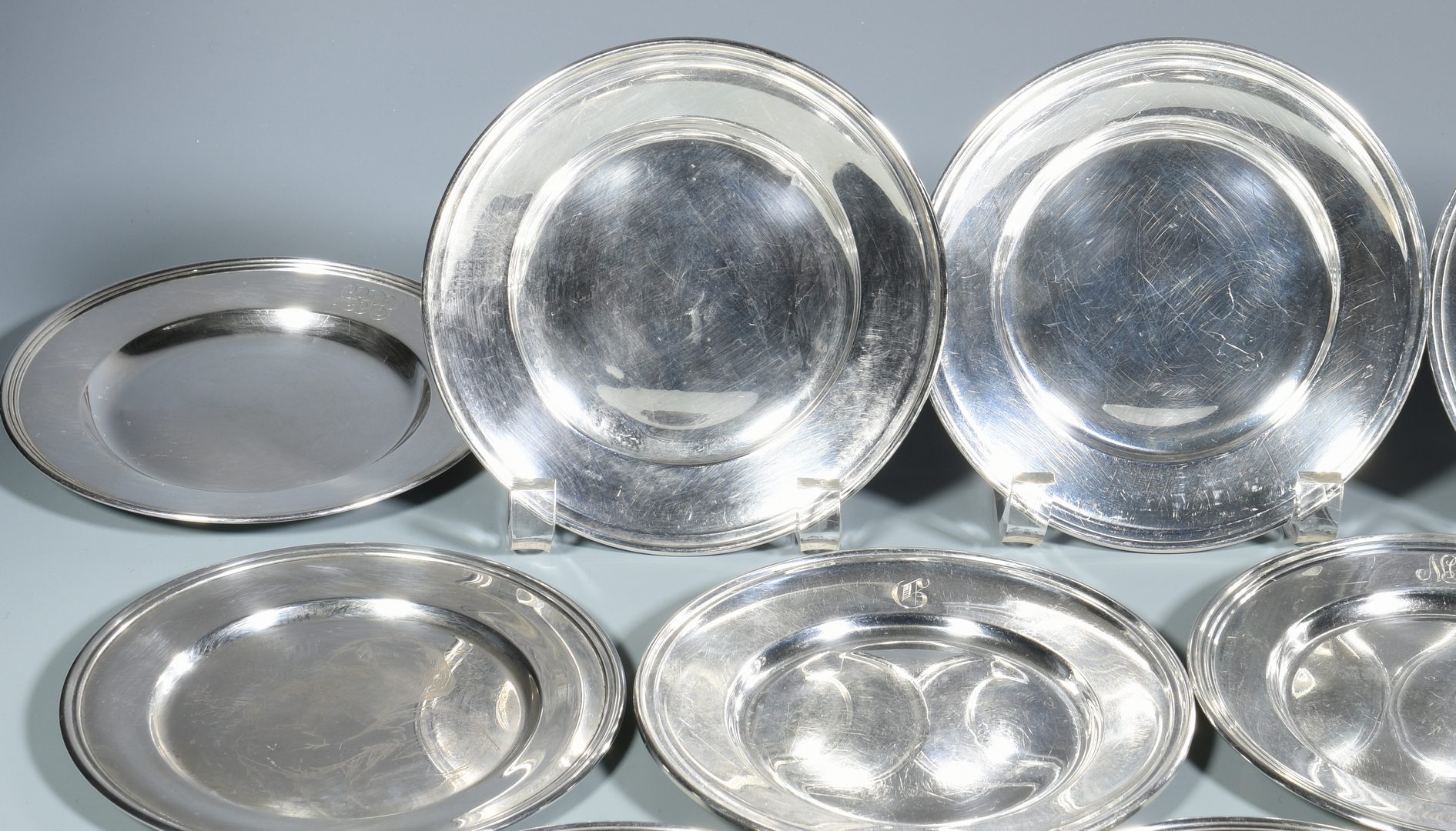 Lot 868: Group 15 Sterling Bread and Butter Plates