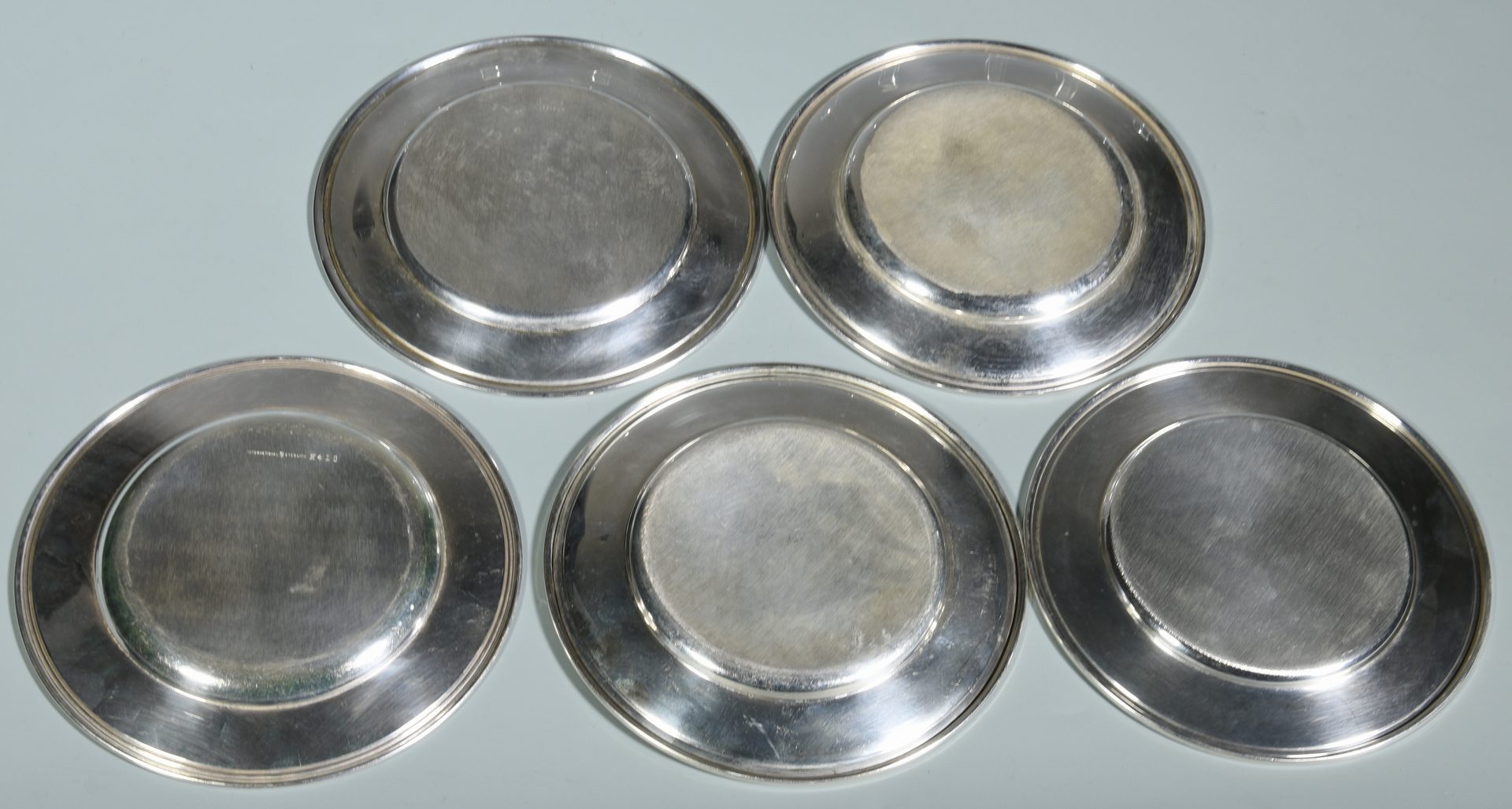 Lot 868: Group 15 Sterling Bread and Butter Plates