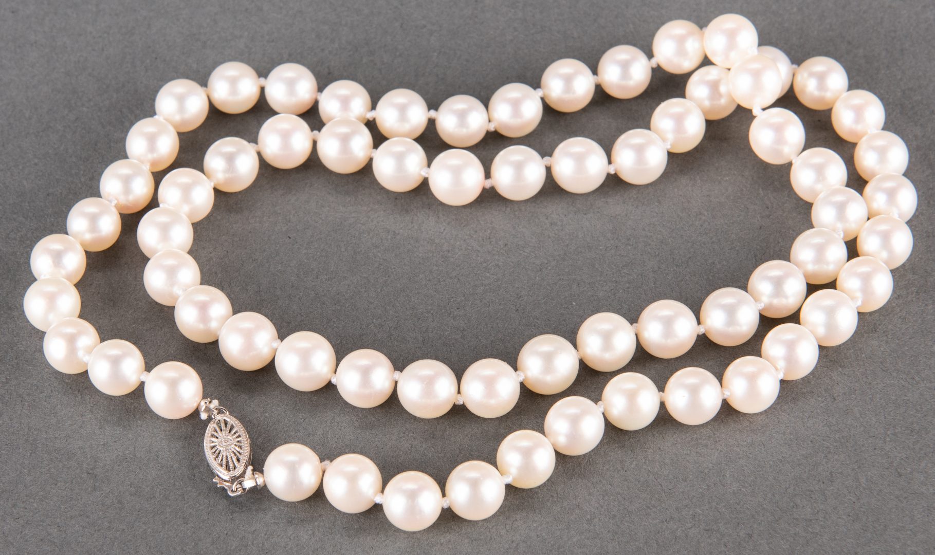Lot 398: Mikimoto 24" 8 x 8.5 mm Pearls