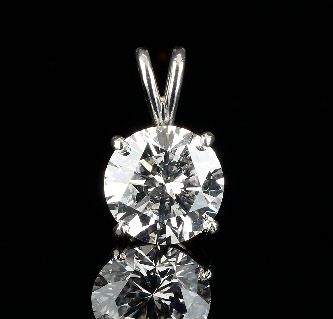Lot 30: 4.18 CTW Diamond Pendant, GIA (VVS2, E)