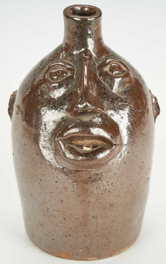 Lot 398: 3 Brown's Pottery, NC Face Jugs, incl. Early Face Jug