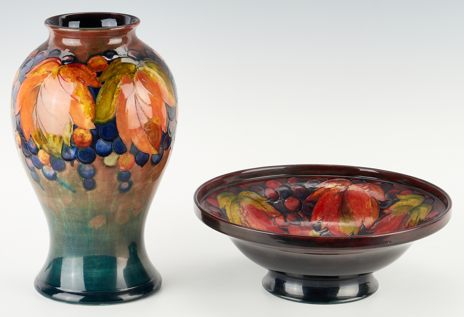 Lot 518: Moorcroft Art Pottery Flambe Grape Vase & Bowl, 2 items