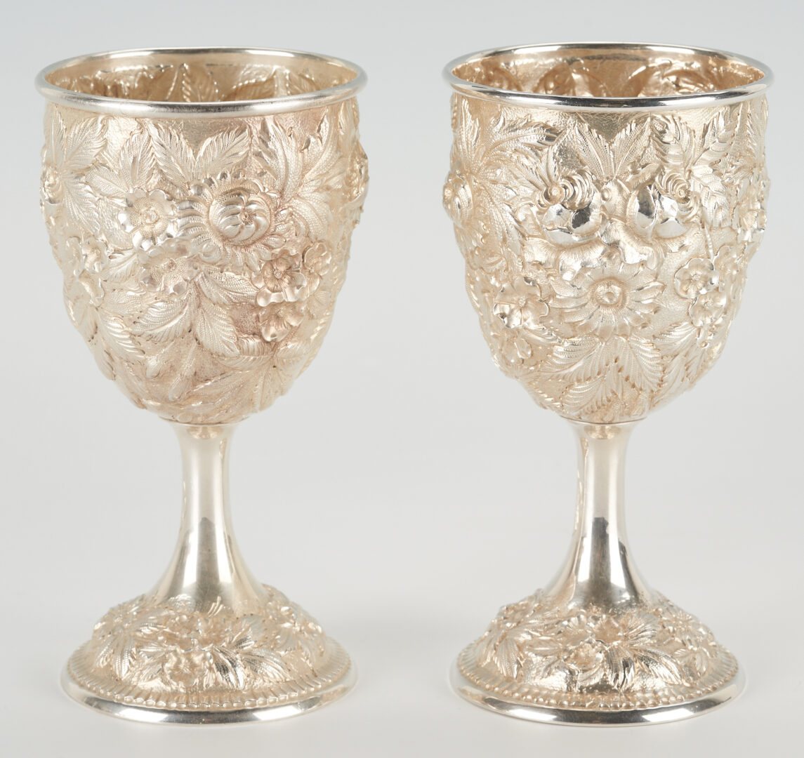 Lot 46: Set of 12 Kirk Repousse Sterling Silver Goblets, Hand Decorated