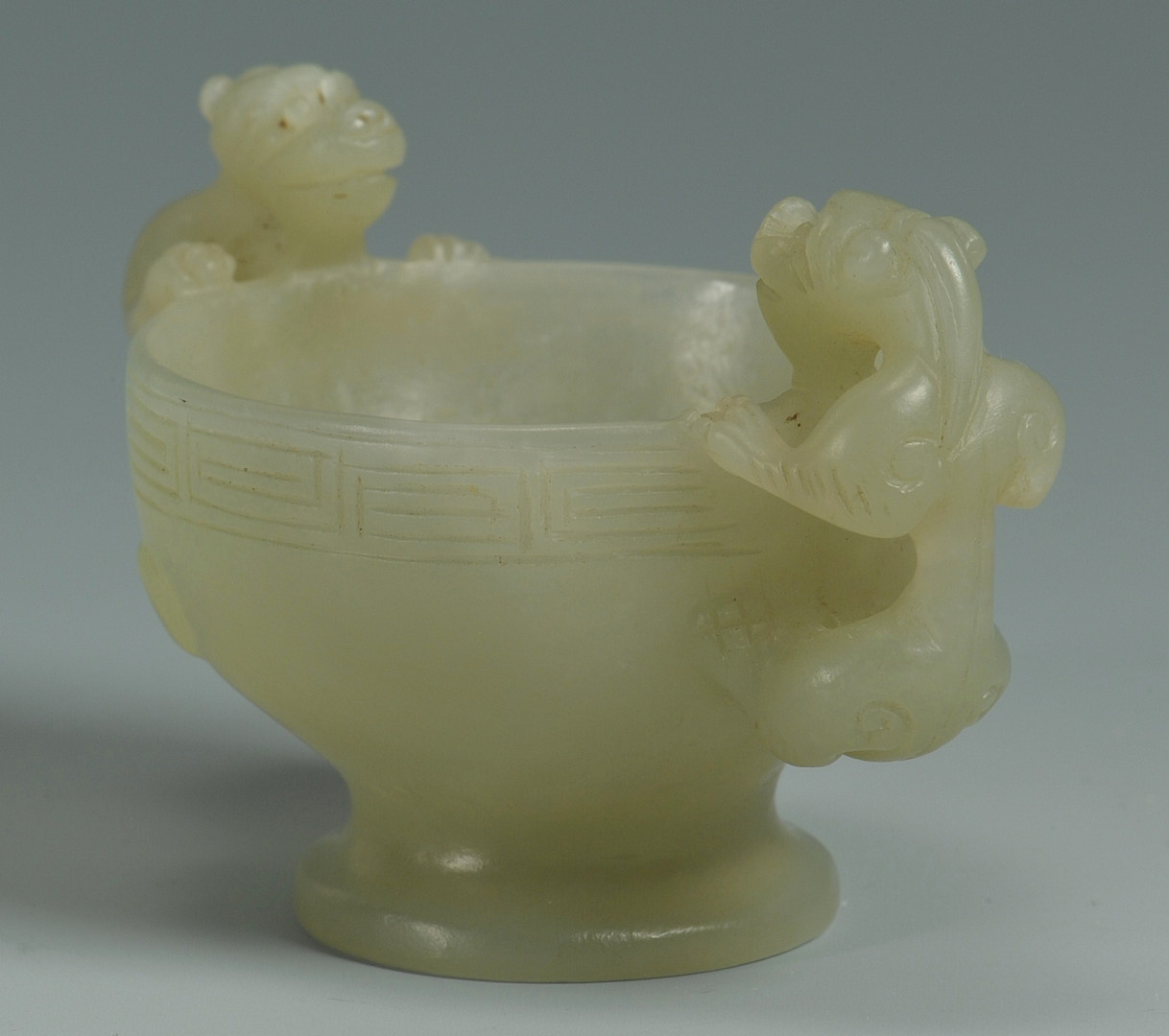 Lot 11: Chinese Jade Footed Cup w/ Foo Dog Handles