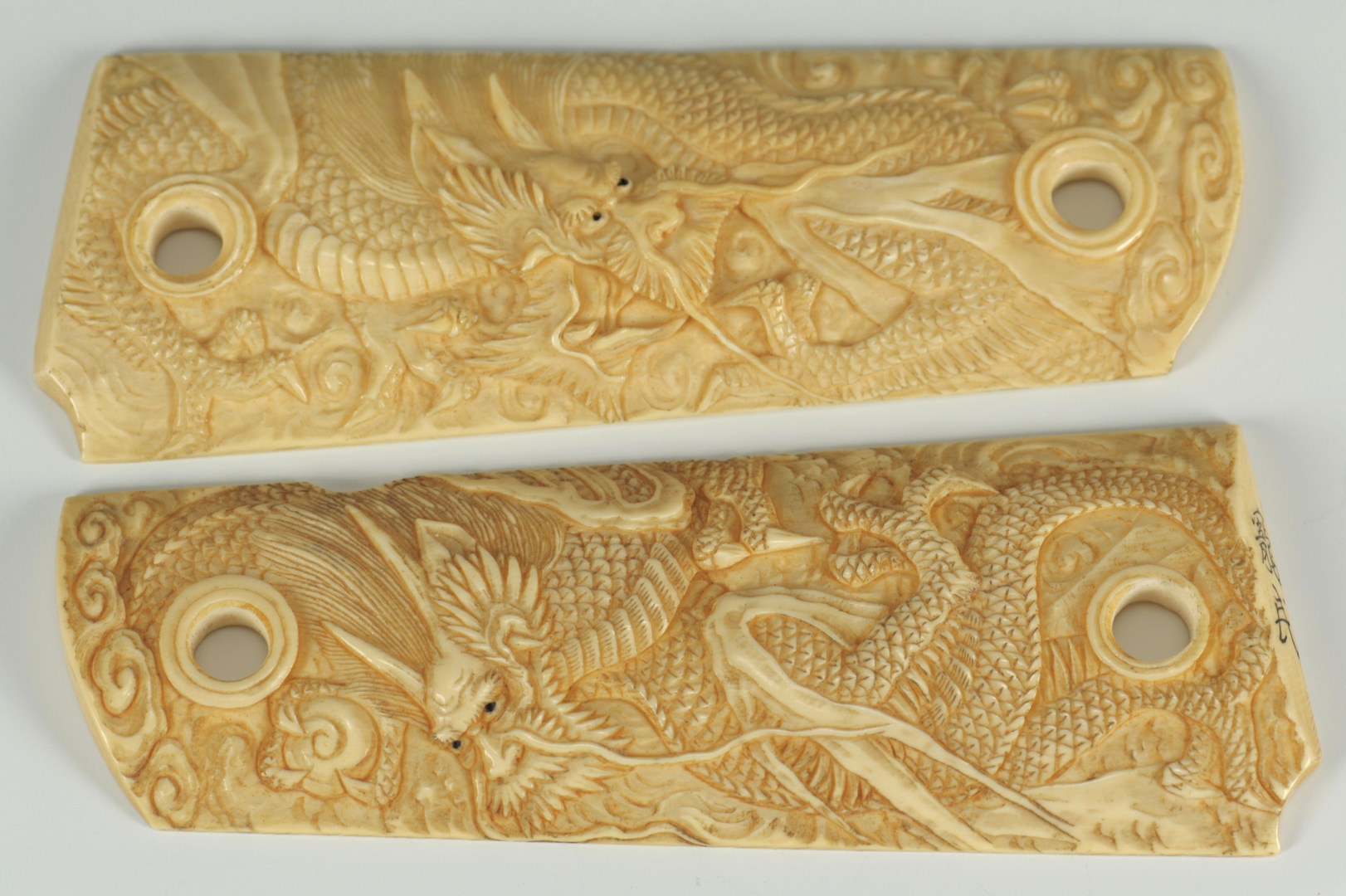 Lot 190: Japanese Ivory: Dragon Pistol Grips and Eggplant