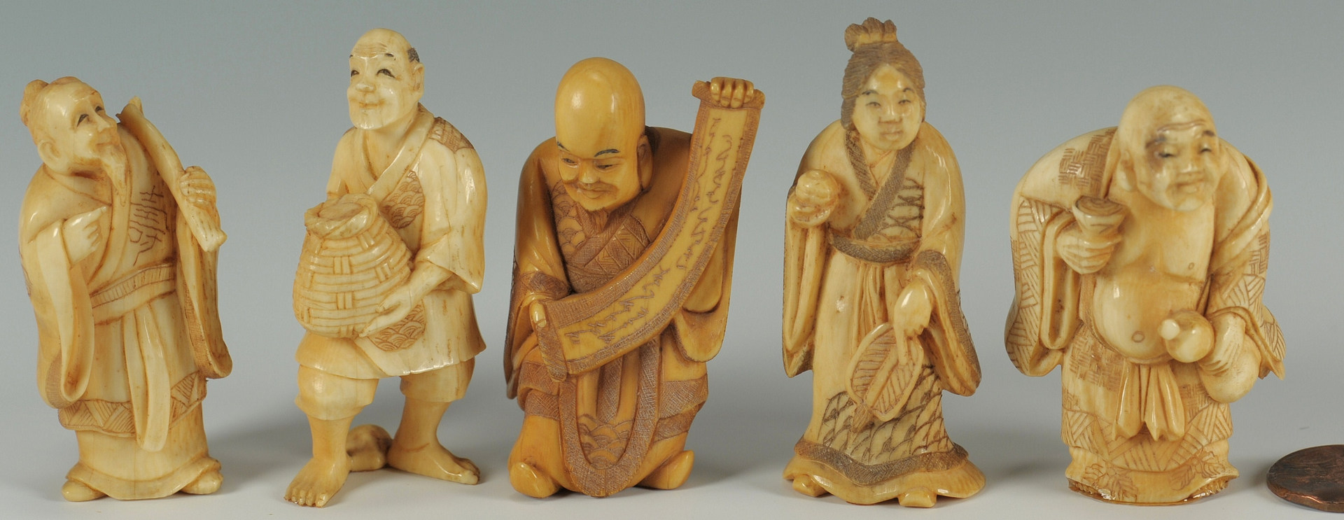 Lot 194: Five signed Japanese Carved Ivory Figures