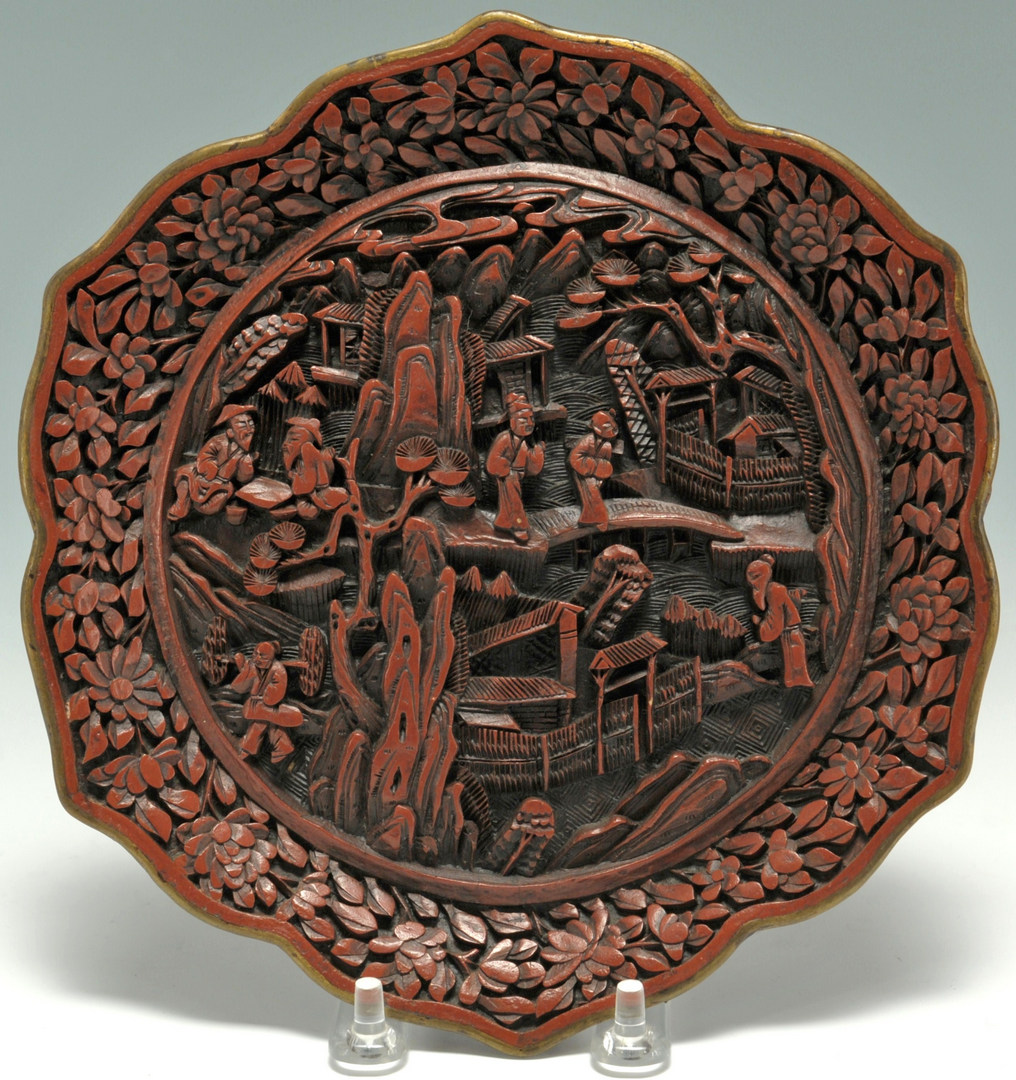 Lot 22: Pair of Chinese carved cinnabar lotus plates
