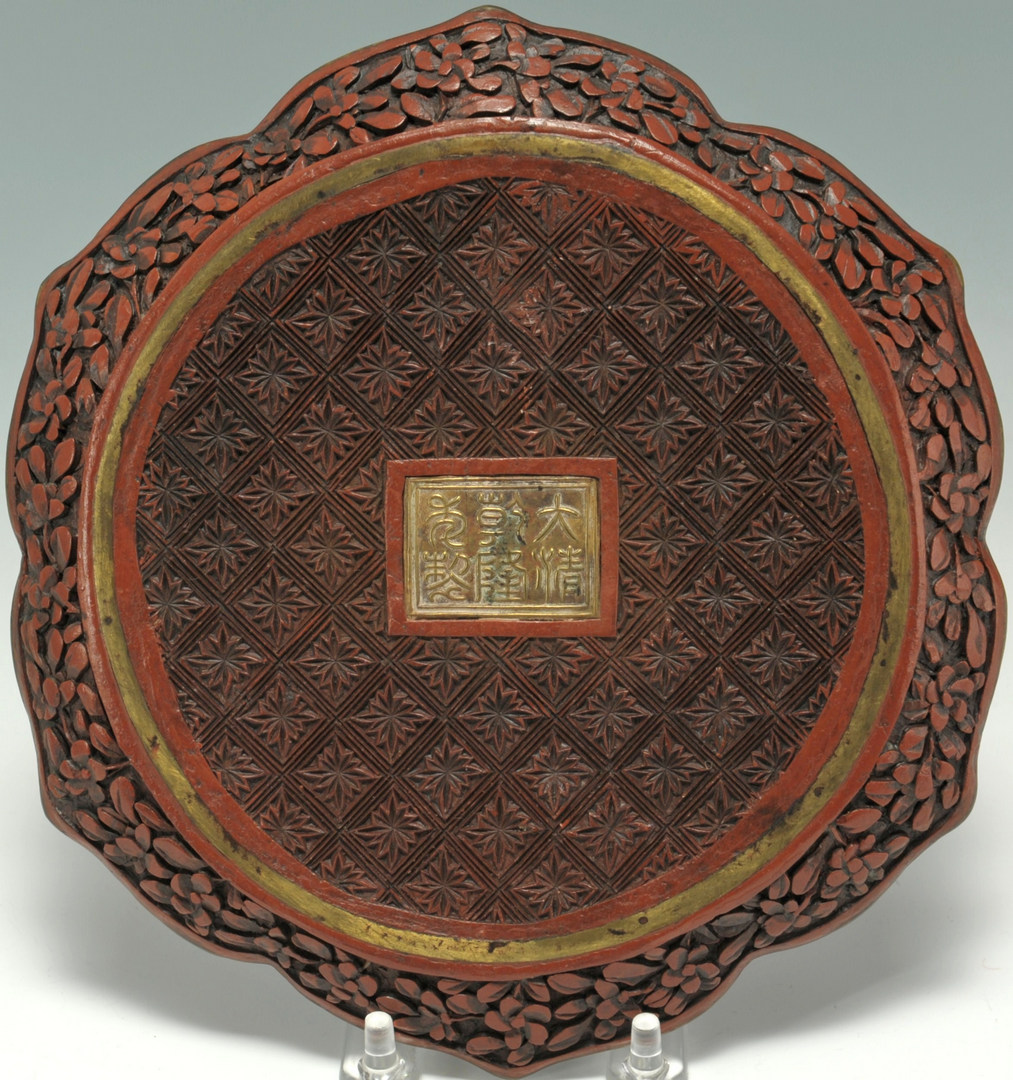 Lot 22: Pair of Chinese carved cinnabar lotus plates