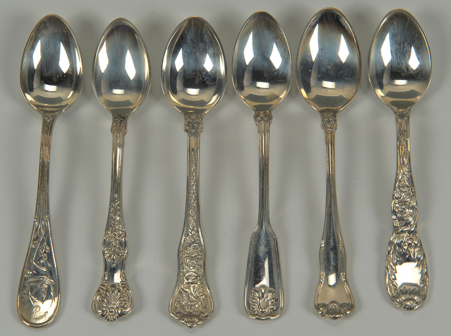 Lot 241: Tiffany sterling spoons and Gorham Versailles