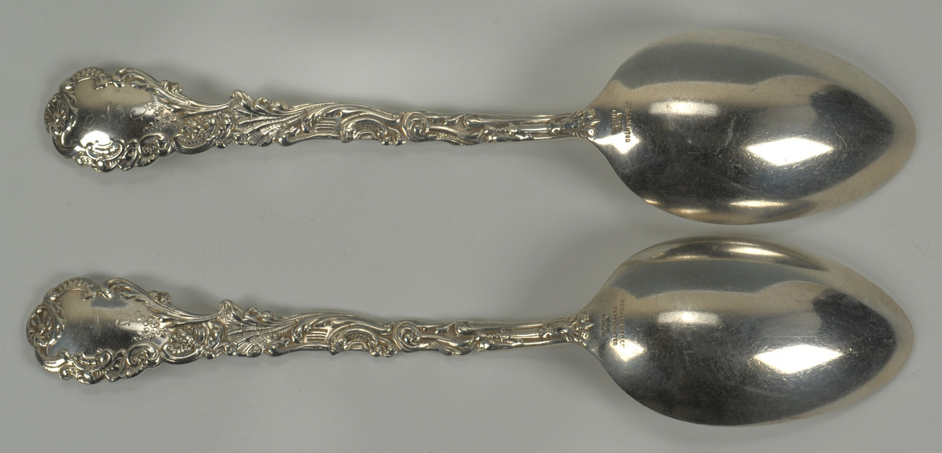 Lot 241: Tiffany sterling spoons and Gorham Versailles