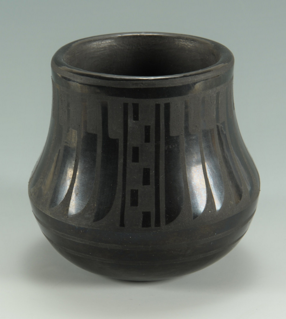 Lot 393: San Ildefonso blackware jar, Blue Corn