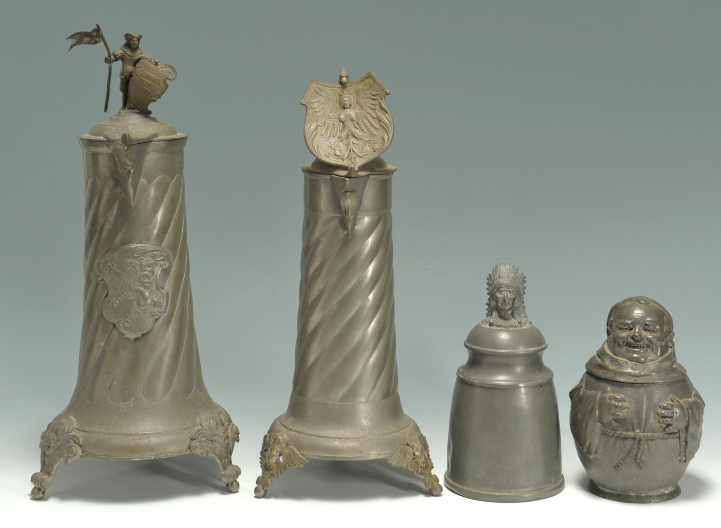 Lot 410: 4 Figural Pewter Steins and pitchers