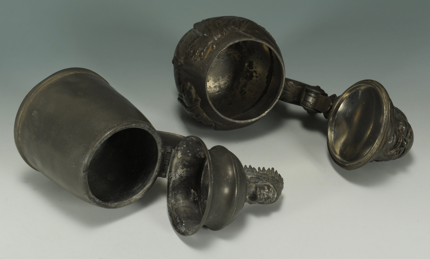 Lot 410: 4 Figural Pewter Steins and pitchers