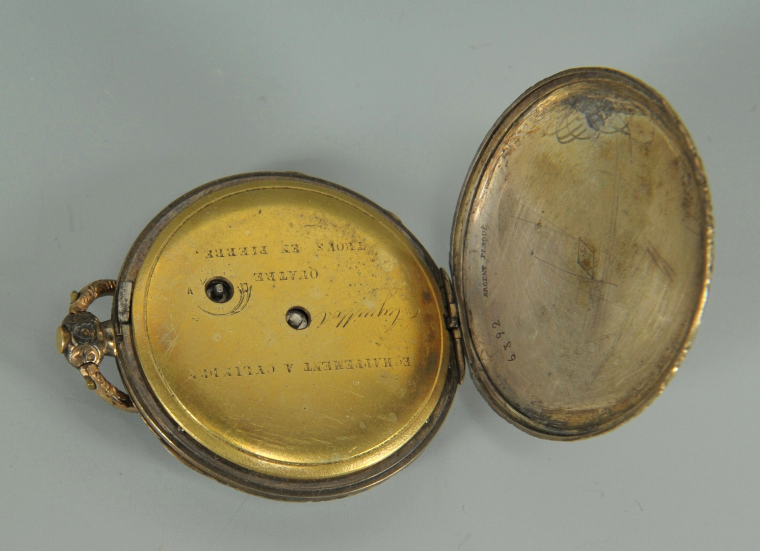 Lot 415: Four pocket watches and a knife