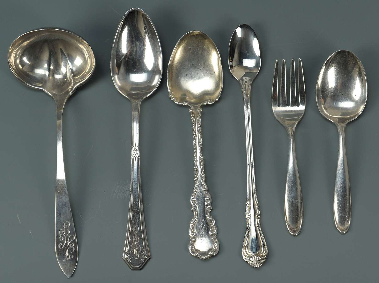 Lot 430: 38 pcs assorted sterling flatware, early patterns