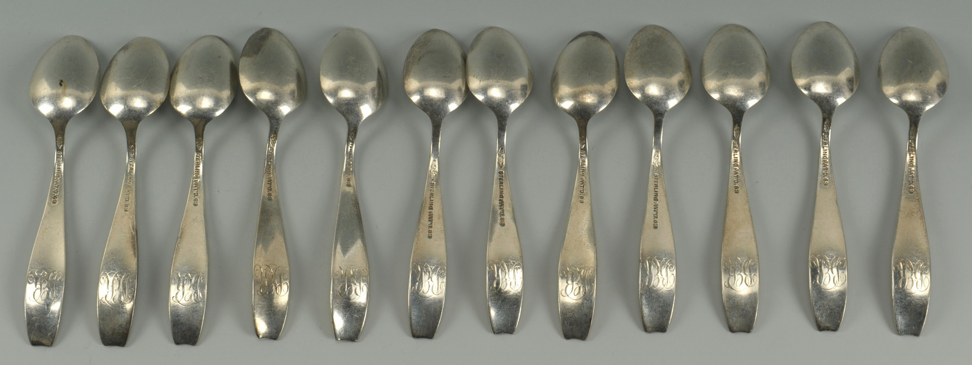Lot 442: 12 Shiebler Flora Demitasse Spoons