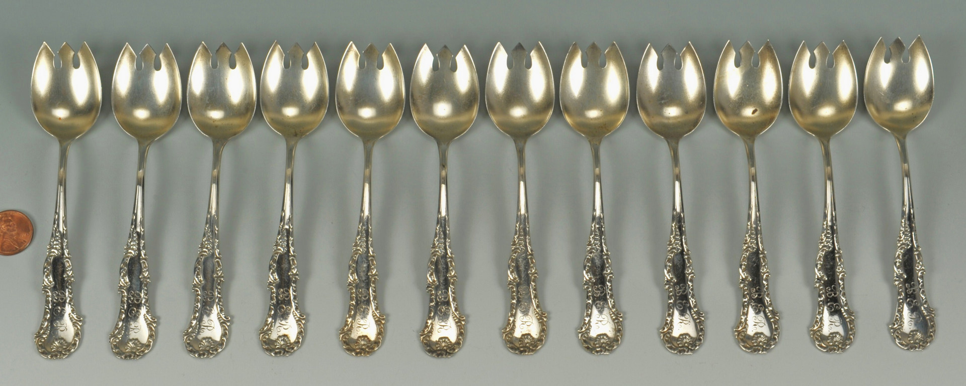 Lot 510: 12 George III Whiting Sterling Ice Cream Forks