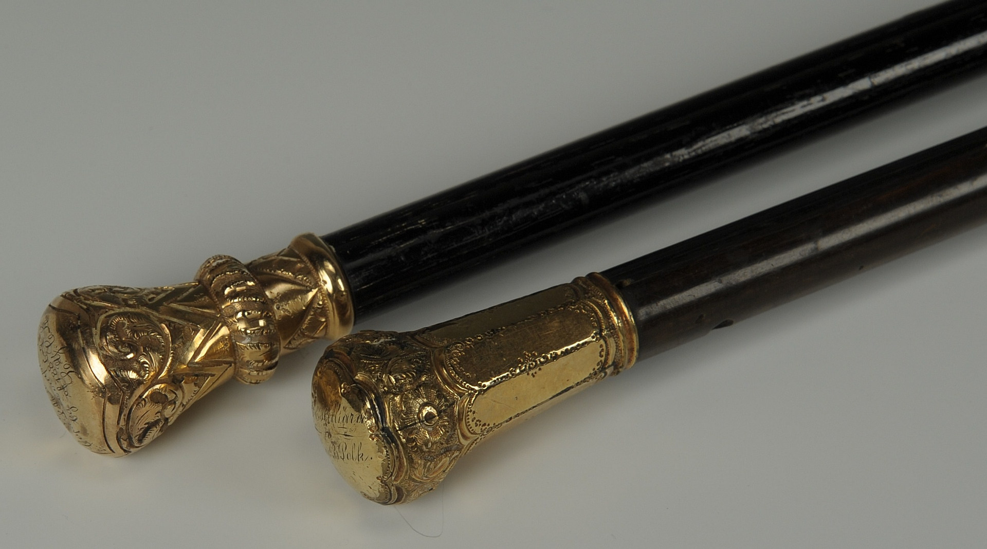 Lot 512: Two gold handled walking sticks, 19th c.