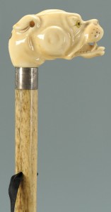 Lot 513: Dog head Ivory handled and bone shaft cane