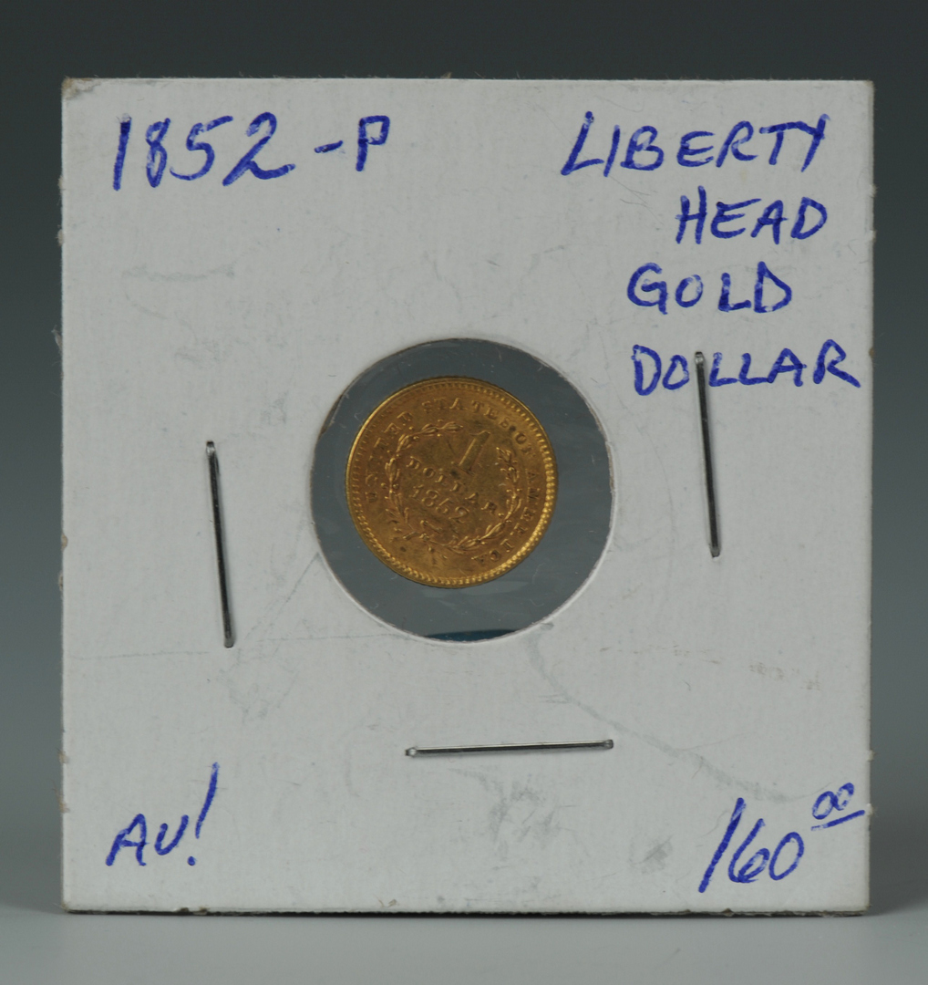 Lot 544: 14K Liberty 5 Dollar ring and Liberty dollar