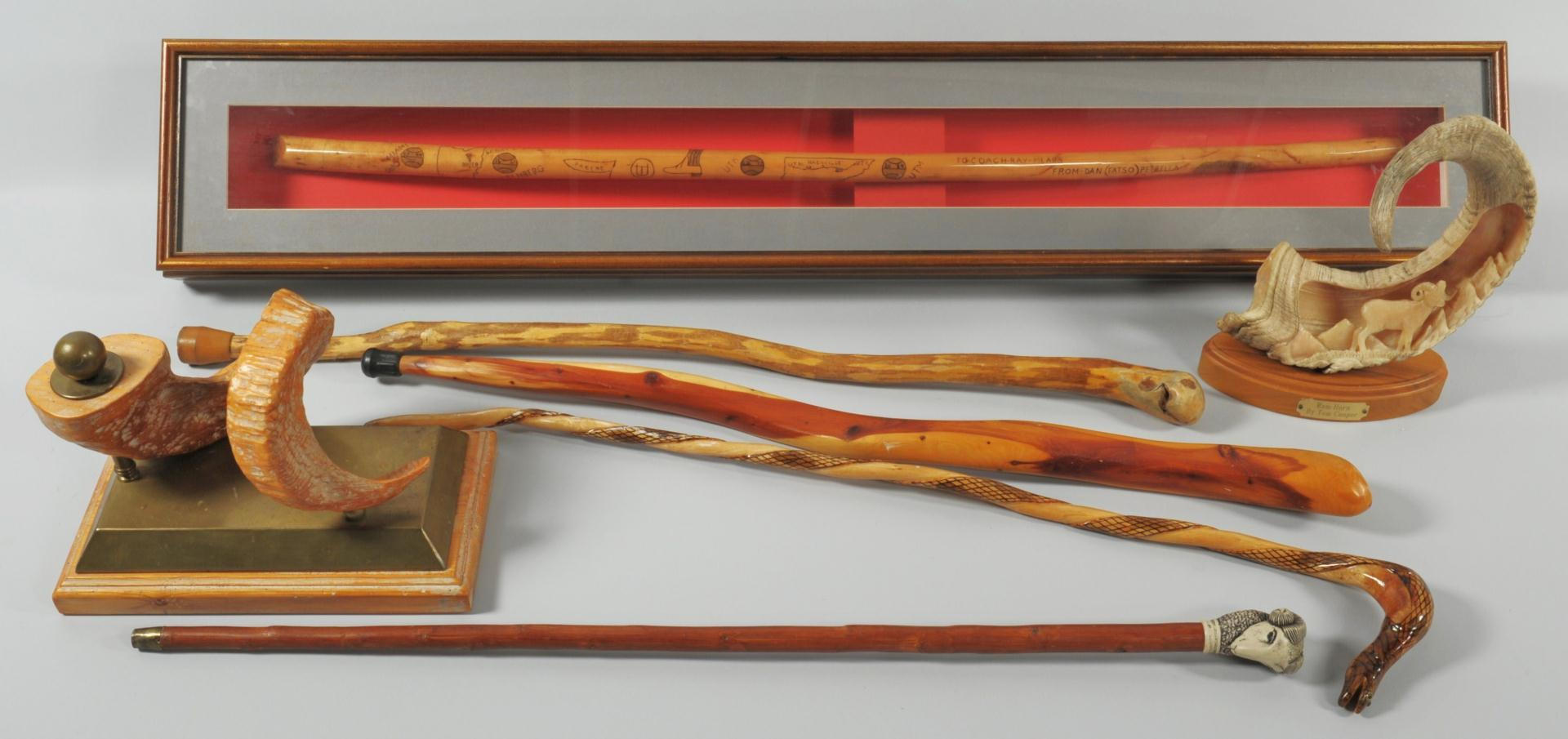 Lot 605: Grouping of Ray Mears decorative items. 2 ram horn