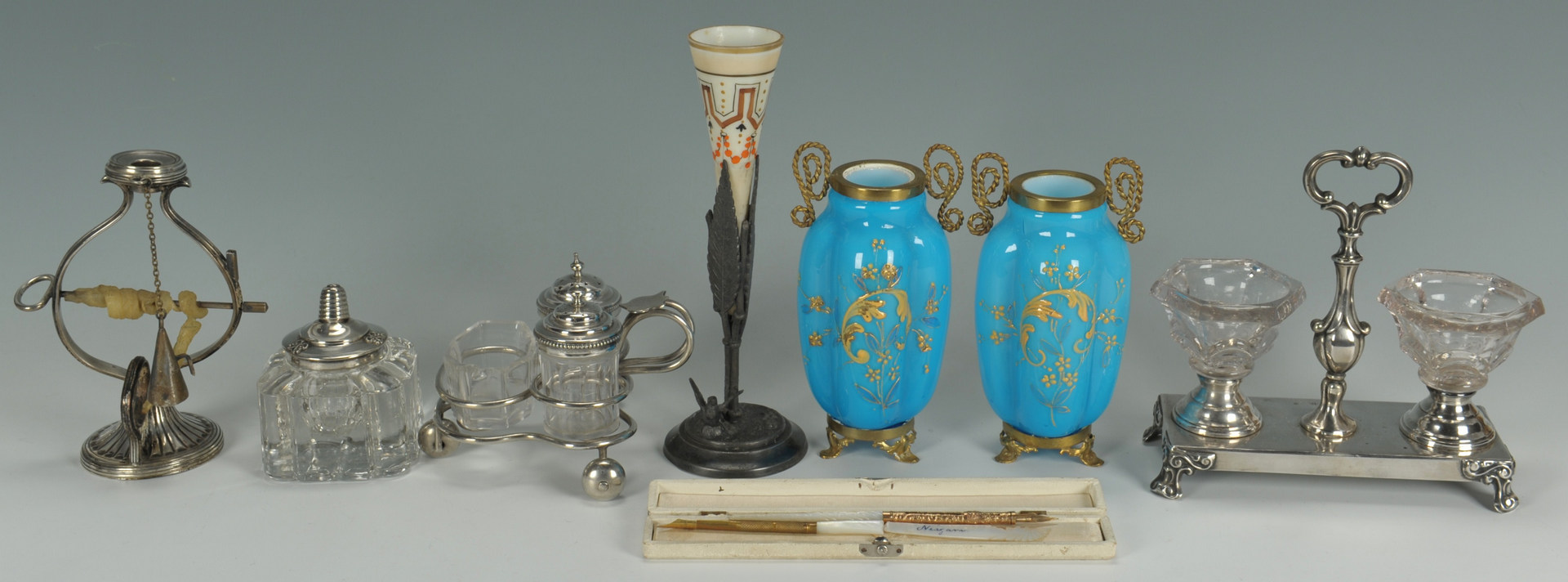 Lot 631: Asst'd silverplate, mother of pearl table items