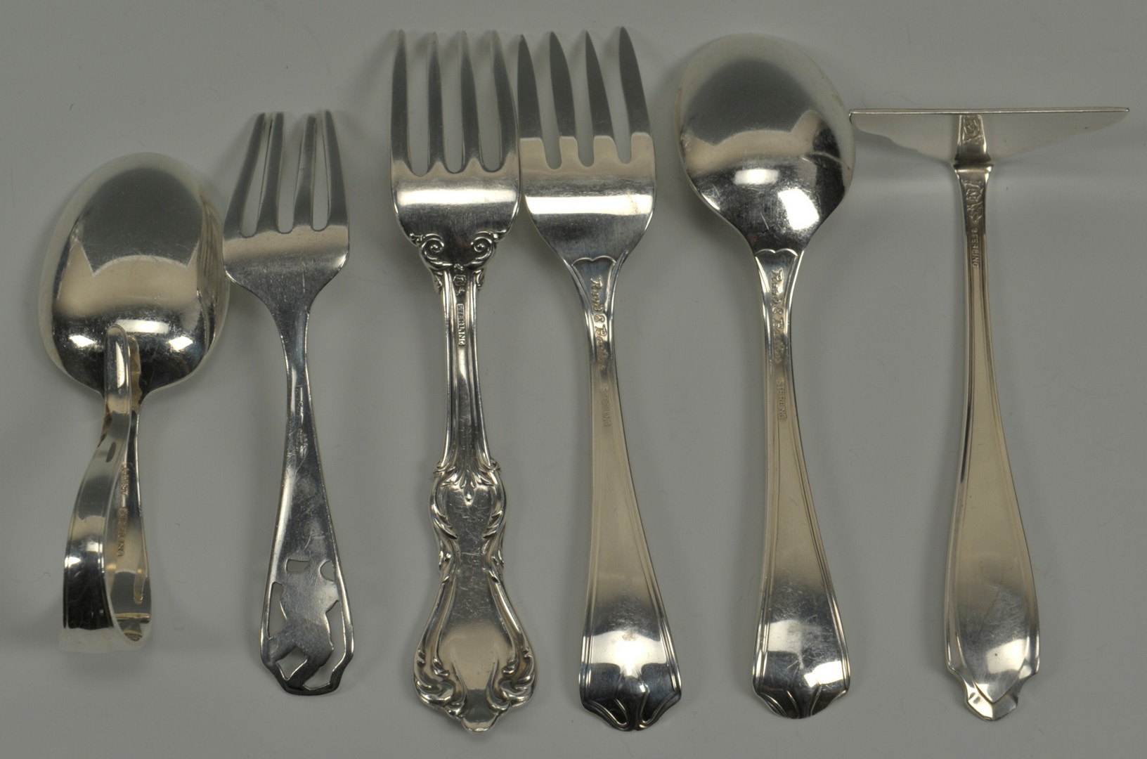 Lot 632: Group of Sterling baby and child items
