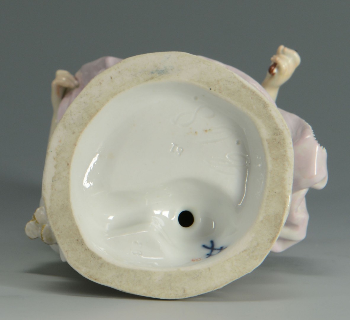 Lot 131: Meissen Porcelain Figure of a Lady w/ flowers
