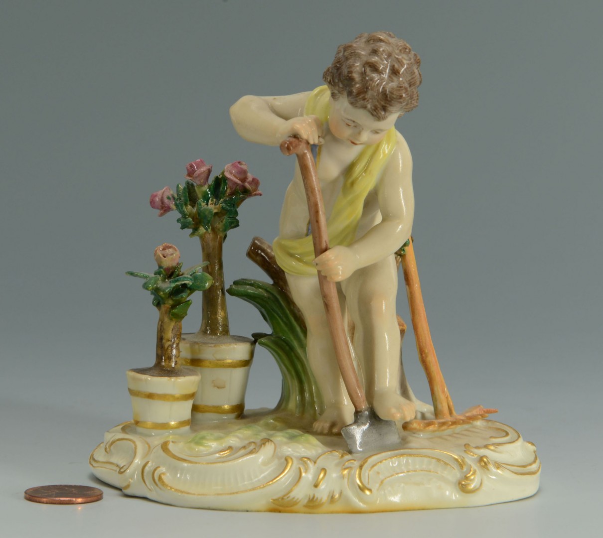 Lot 133: Meissen Porcelain Figure, cherub gardener