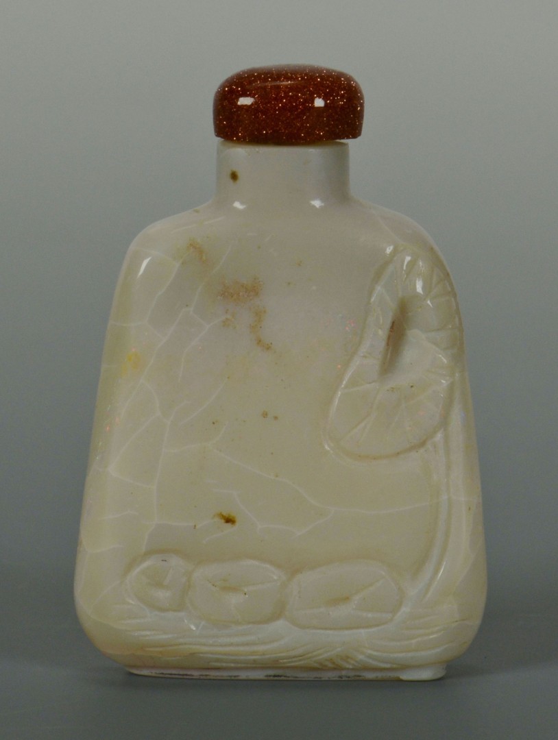 Lot 17: Chinese Qing Carved White Jade Snuff Bottle