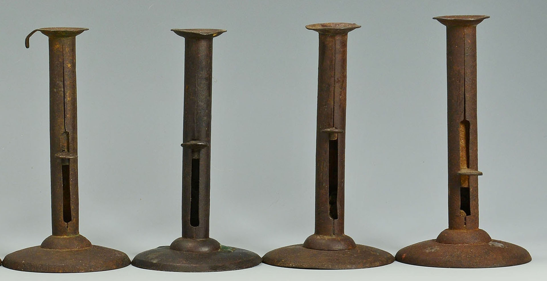Lot 286: Grouping of Early Tin and Iron Lighting, 15 items