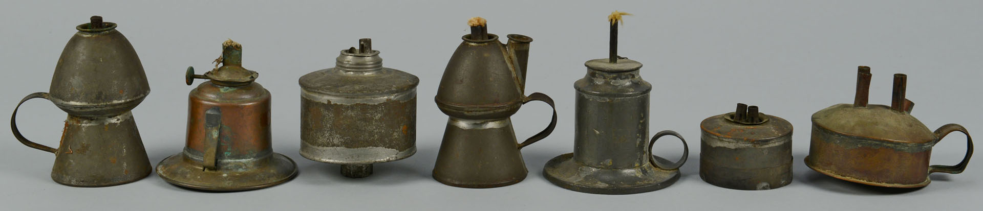 Lot 287: Large grouping of tin lighting related items