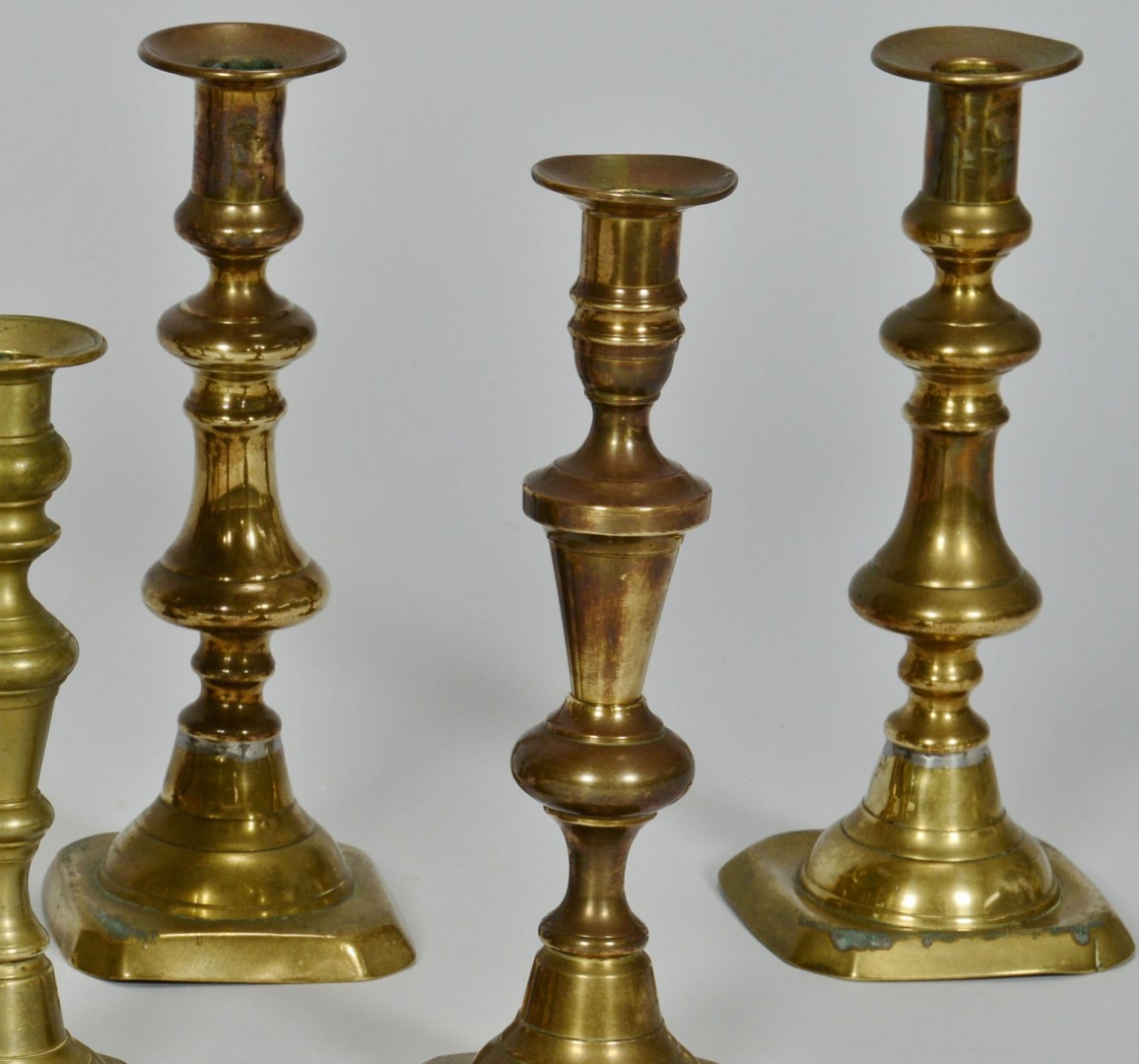 Lot 426: Grouping of 10 Brass Candlesticks, 5 pairs