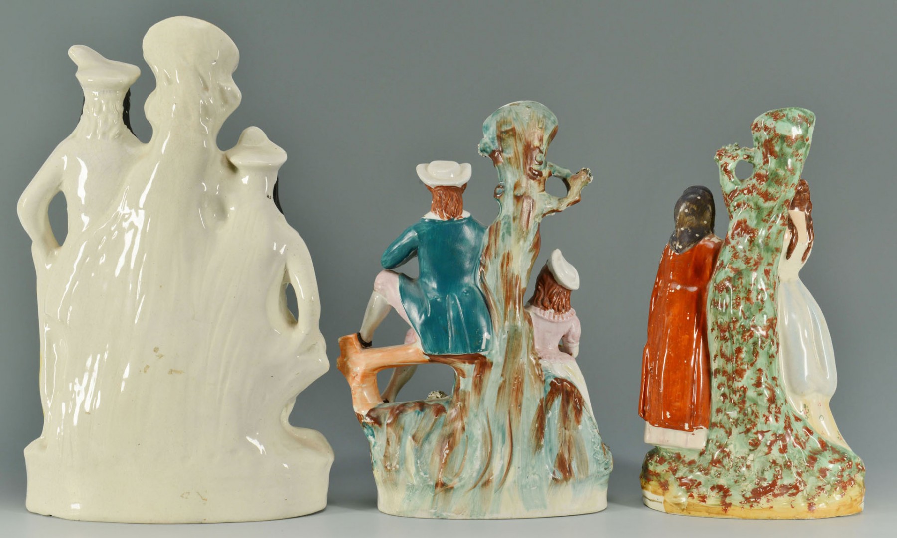 Lot 437: 3 Staffordshire Spill Vase Figural scenes
