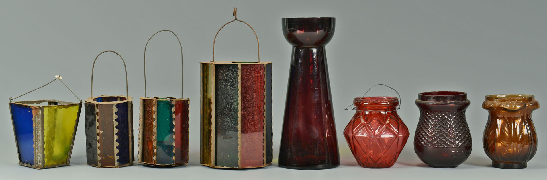 Lot 520: 12 Colored Christmas lights, lanterns, and vase
