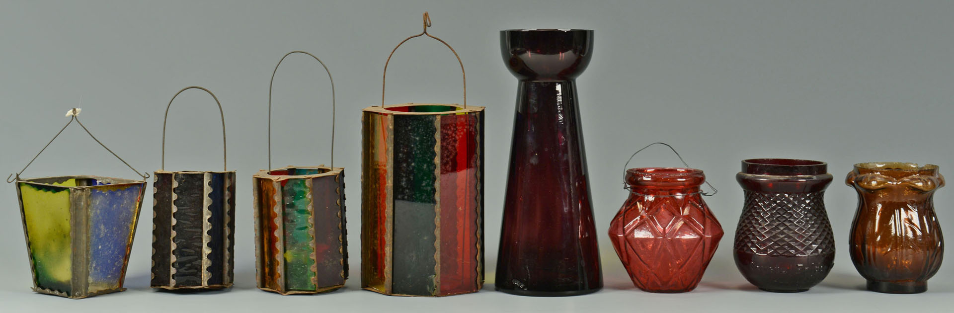 Lot 520: 12 Colored Christmas lights, lanterns, and vase