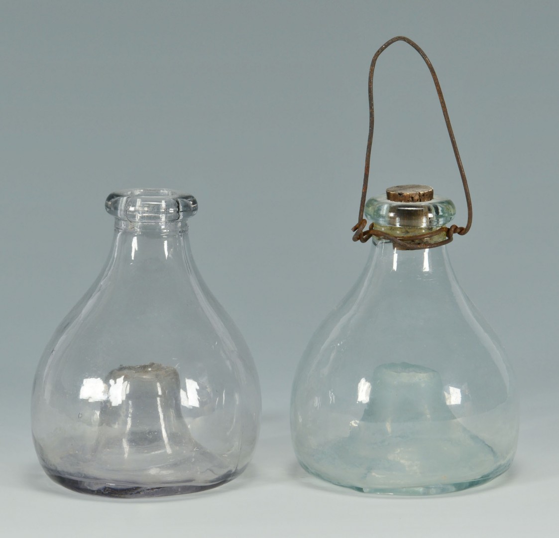 Lot 528: Two early blown glass fly catchers