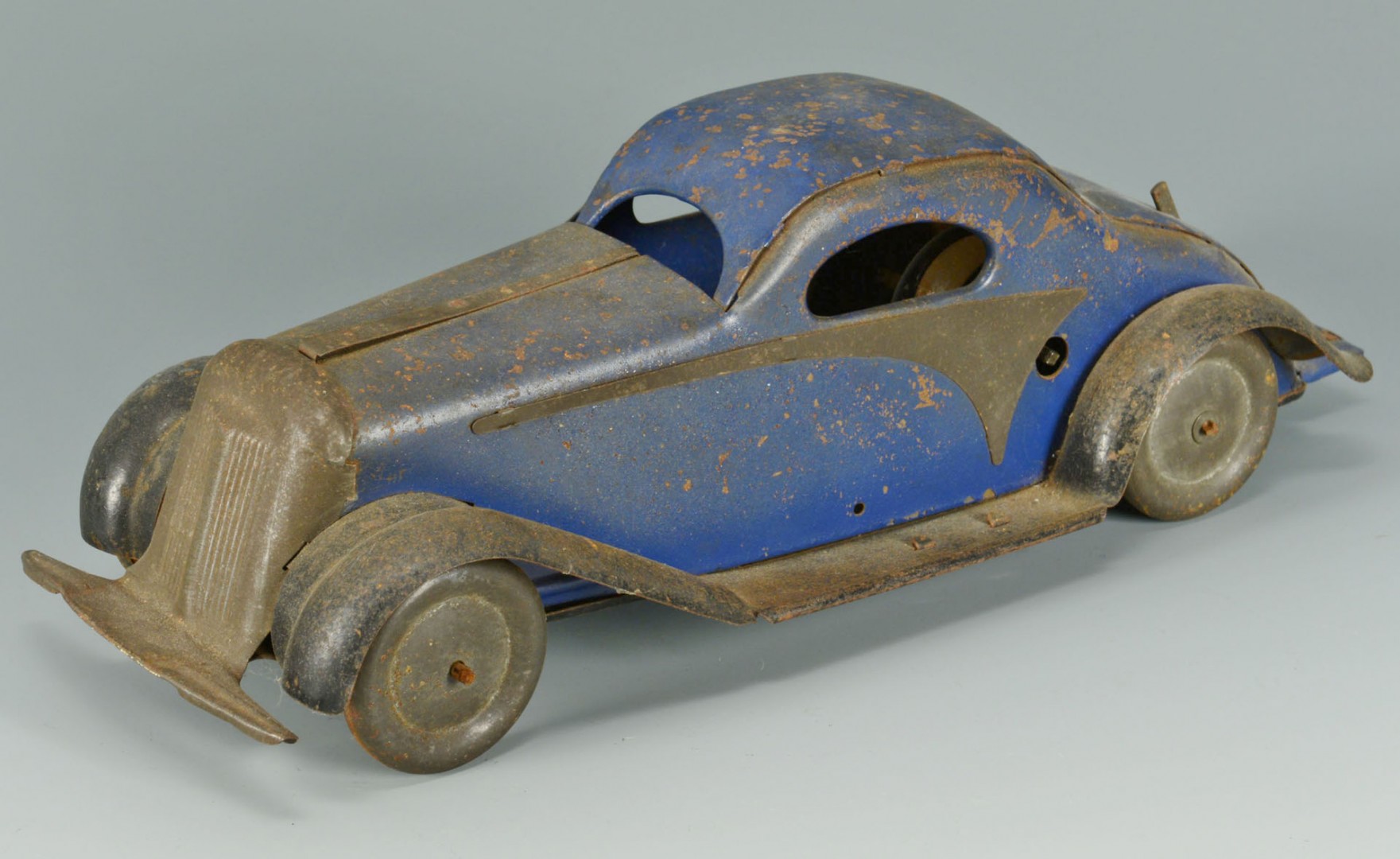 Lot 591: 4 Lithographed Tin Toys